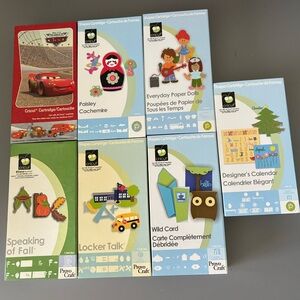 Bundle of 7 Cricut cartridges Cars, WildCard, etc.
